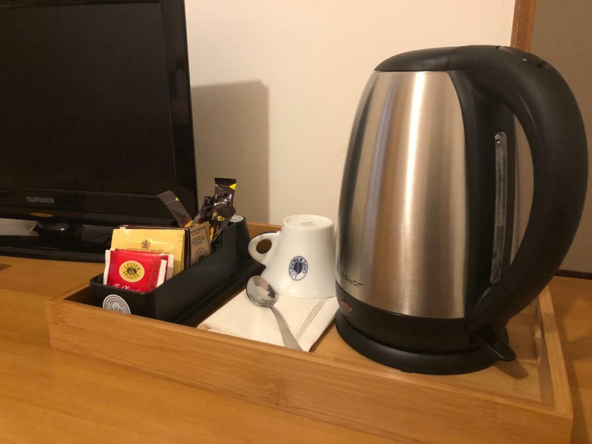 Camera Matrimoniale/Doppia con Letti Singoli con Letto Supplementare